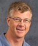 Rotten Apples and Sterling Examples: Moral Reasoning and Peer Influences on Honesty in Managerial Reporting