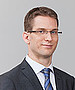 Asymmetric Information and the Distribution of Trading Volume